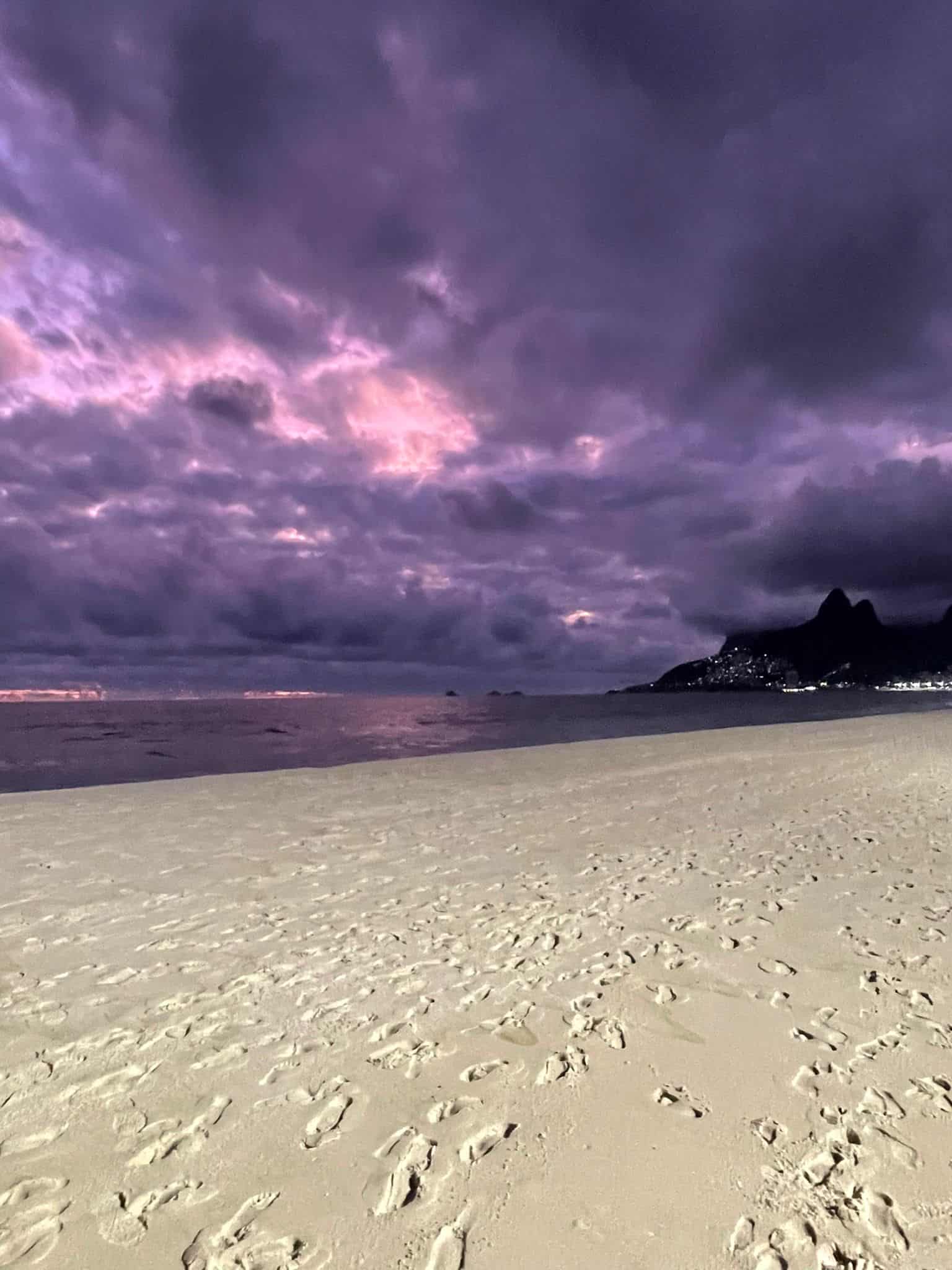 Ipanema Beach in Brazil, with purple skies at night