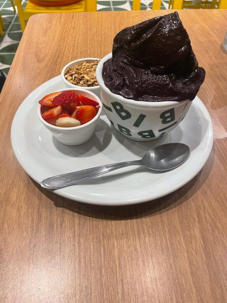 A bowl of purple Acai I had in Rio, with toppings of strawberries and granola.