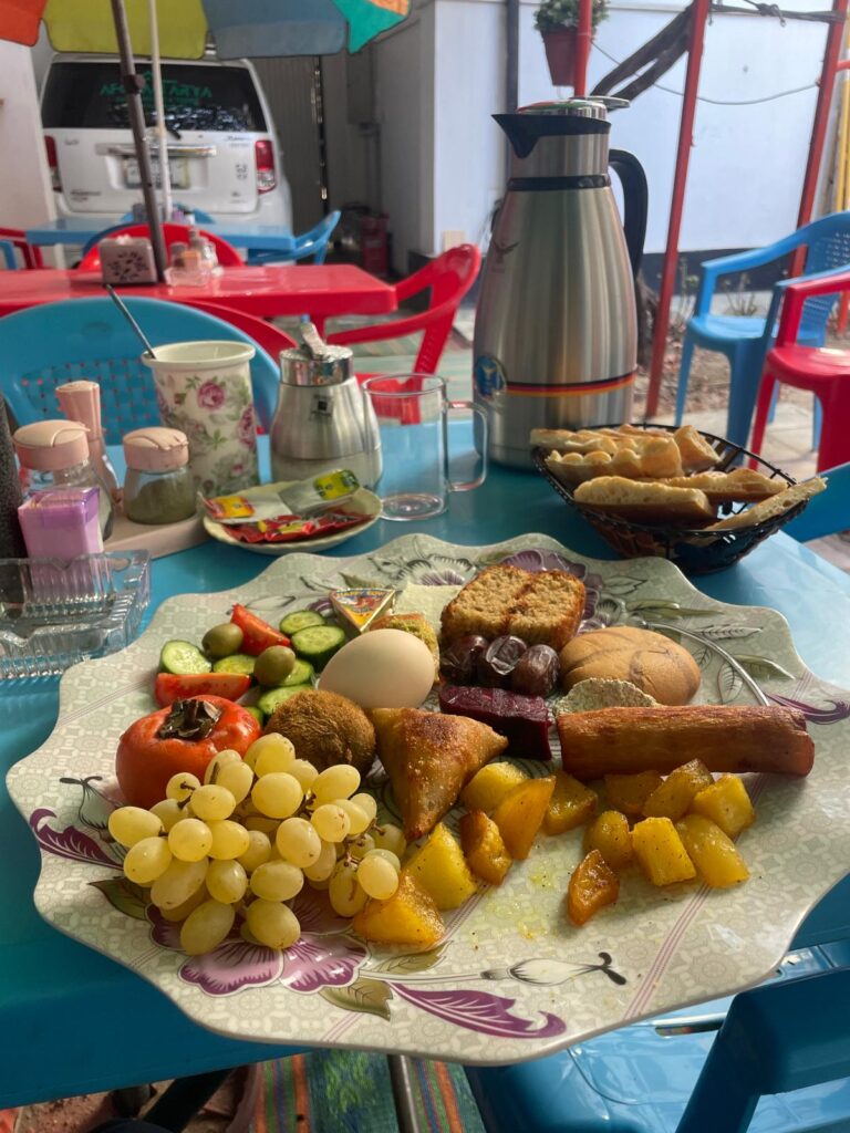 A large platter of food that was included for breakfast at the Afghan Arya Guesthouse in Kabul.