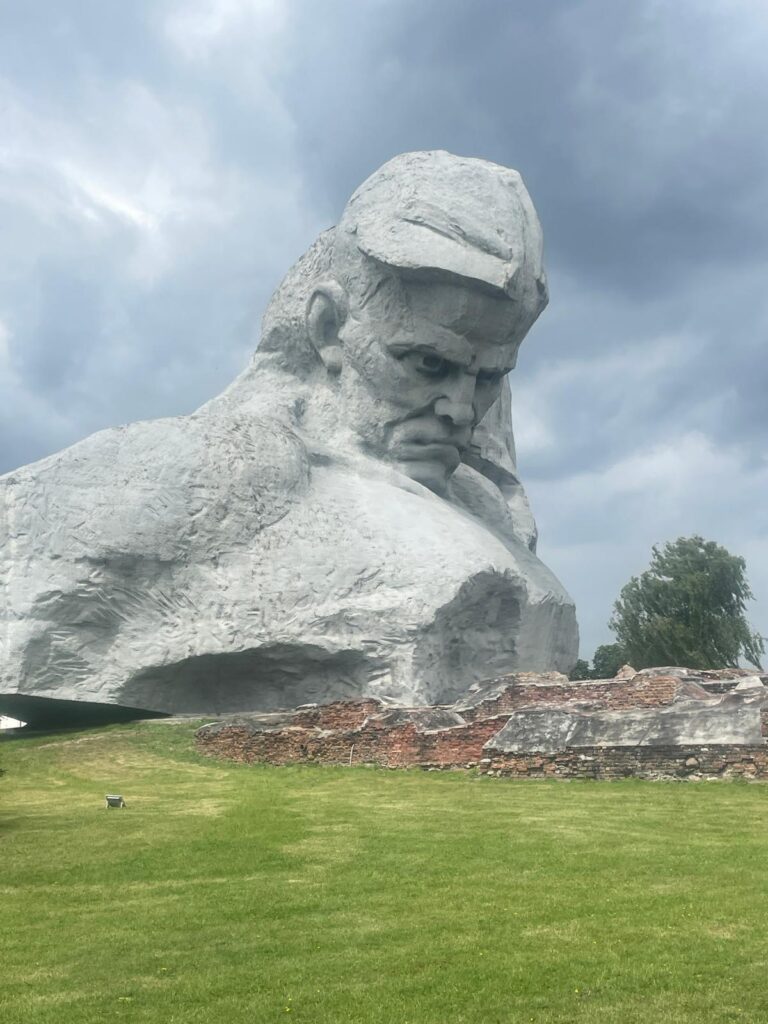 The Courage Monument: a giant stone statue of a Soviet soldier in the brutalist architecture style at Brest Fortress in Belarus.
