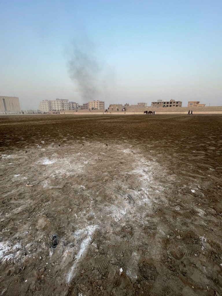 The white goal circle at Mazar-i-Sharif's buzkashi ground in Afghanistan. It's in a bad state after being trampled over by horses during a game.