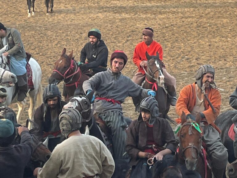 A group of men playing buzkashi in Mazar-i-Sharif, Afghanistan.