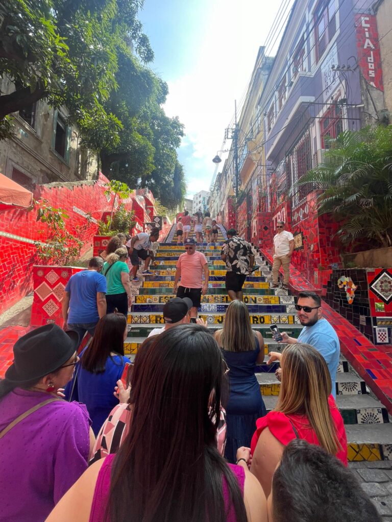 Escaderia Selaron in Rio de Janeiro: a colourful staircase created by artist Jorge Selaron. In this image it is obscured by large groups of tourists.