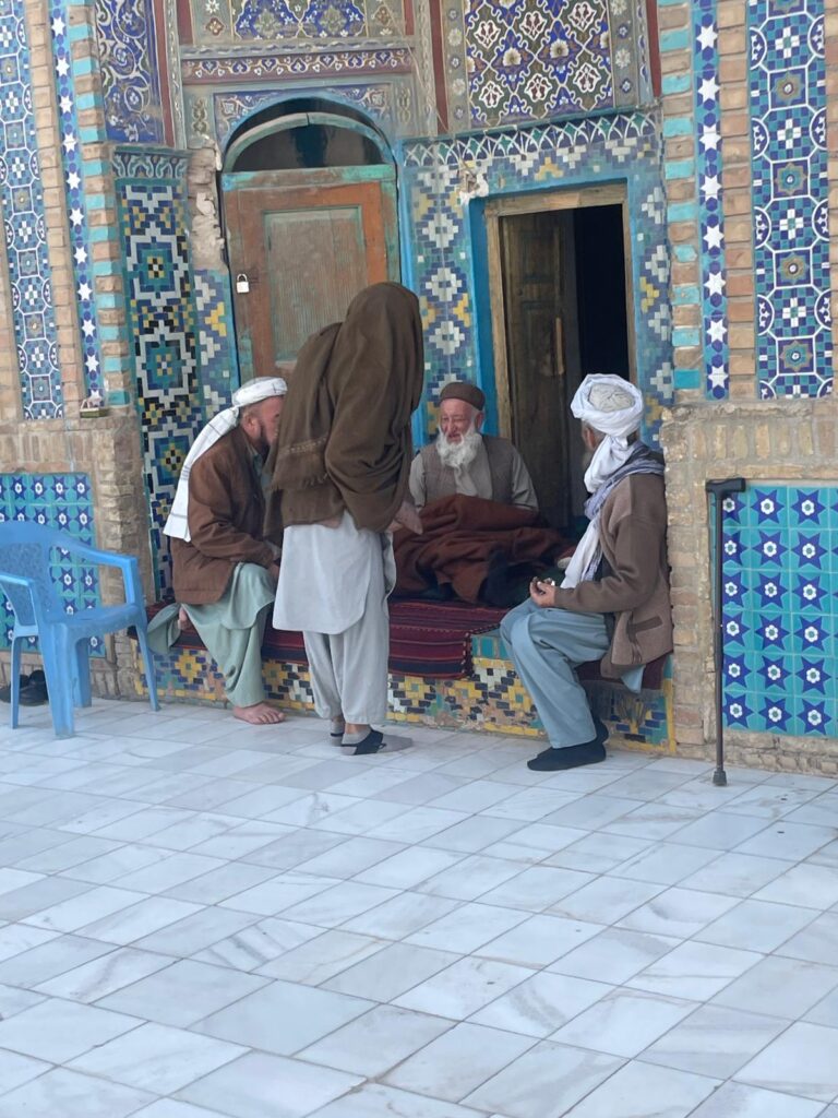 A group of local men outside the Blue Mosque in Mazar-i-Sharif, Afghanistan.