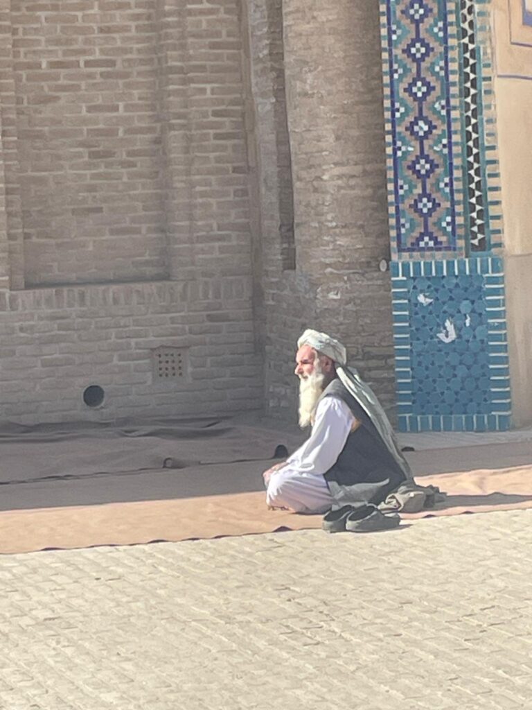 A man outside the Green Mosque in Balkh, Afghanistan.