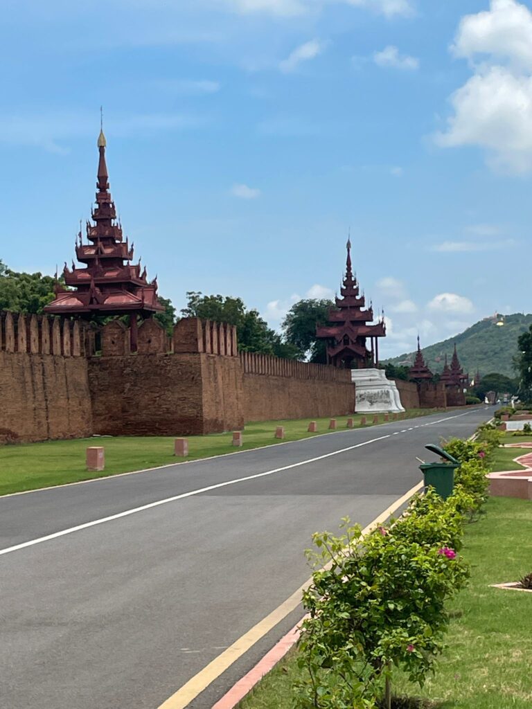 Mandalay Palace surrounded by walls on the outside.