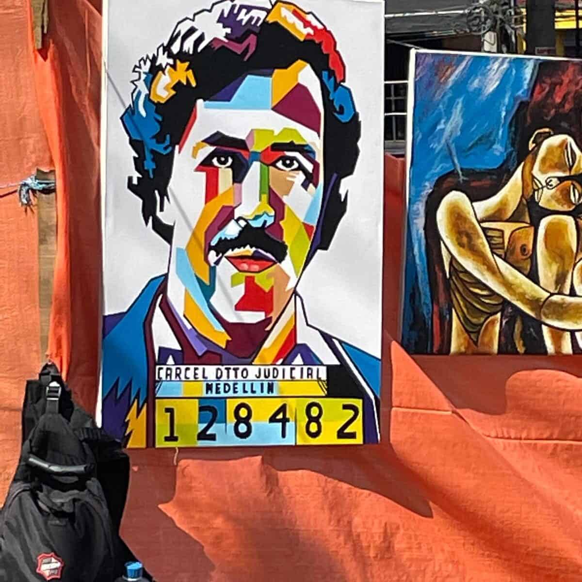 A painting of Medellin drug lord Pablo Escobar, alongside his prison number 128482.