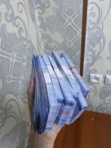 A large stack of money (Uzbek som) I obtained at the bank in Andijon.