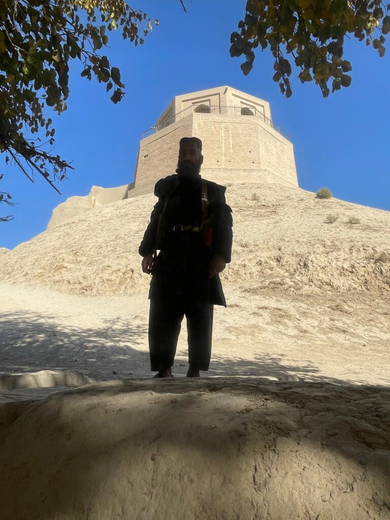 Our Taliban bodyguard standing by an ancient fortress in Balkh, Afghanistan.