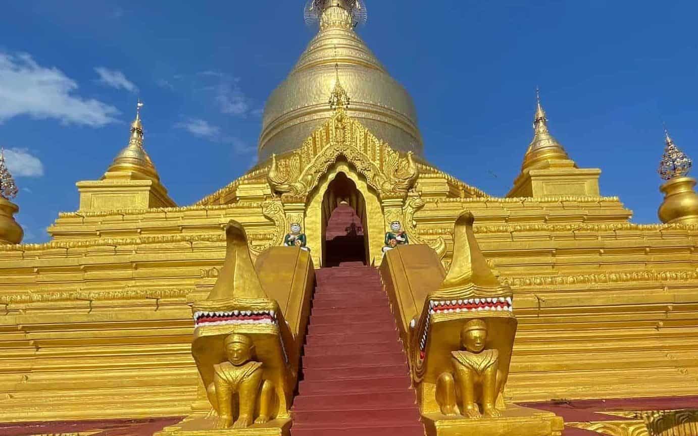 The golden stupa with red steps at Kuthodaw Pagoda in Mandalay, Myanmar