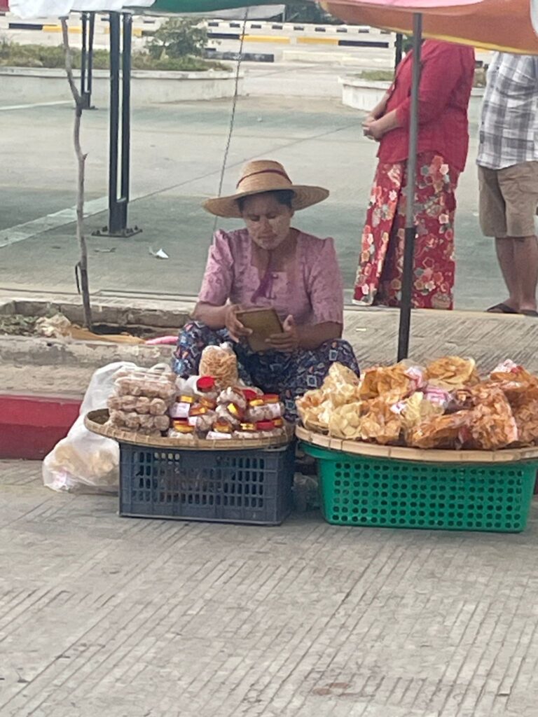 A food seller on the streets of Yangon