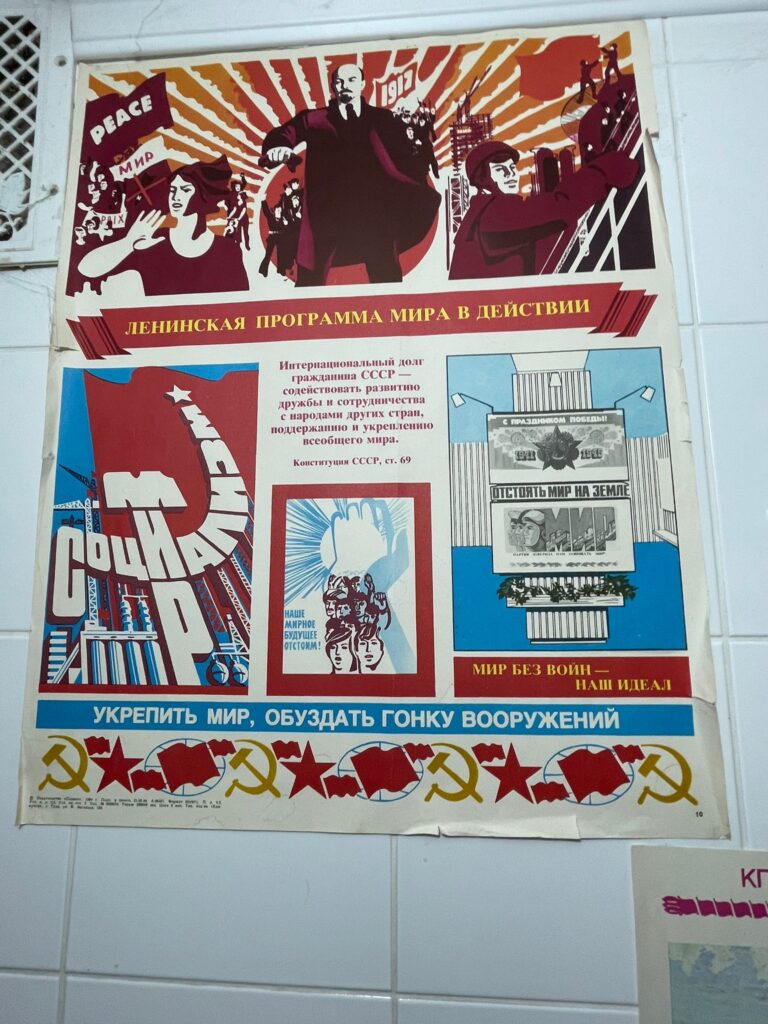 Lenin on a propaganda poster in the bathroom