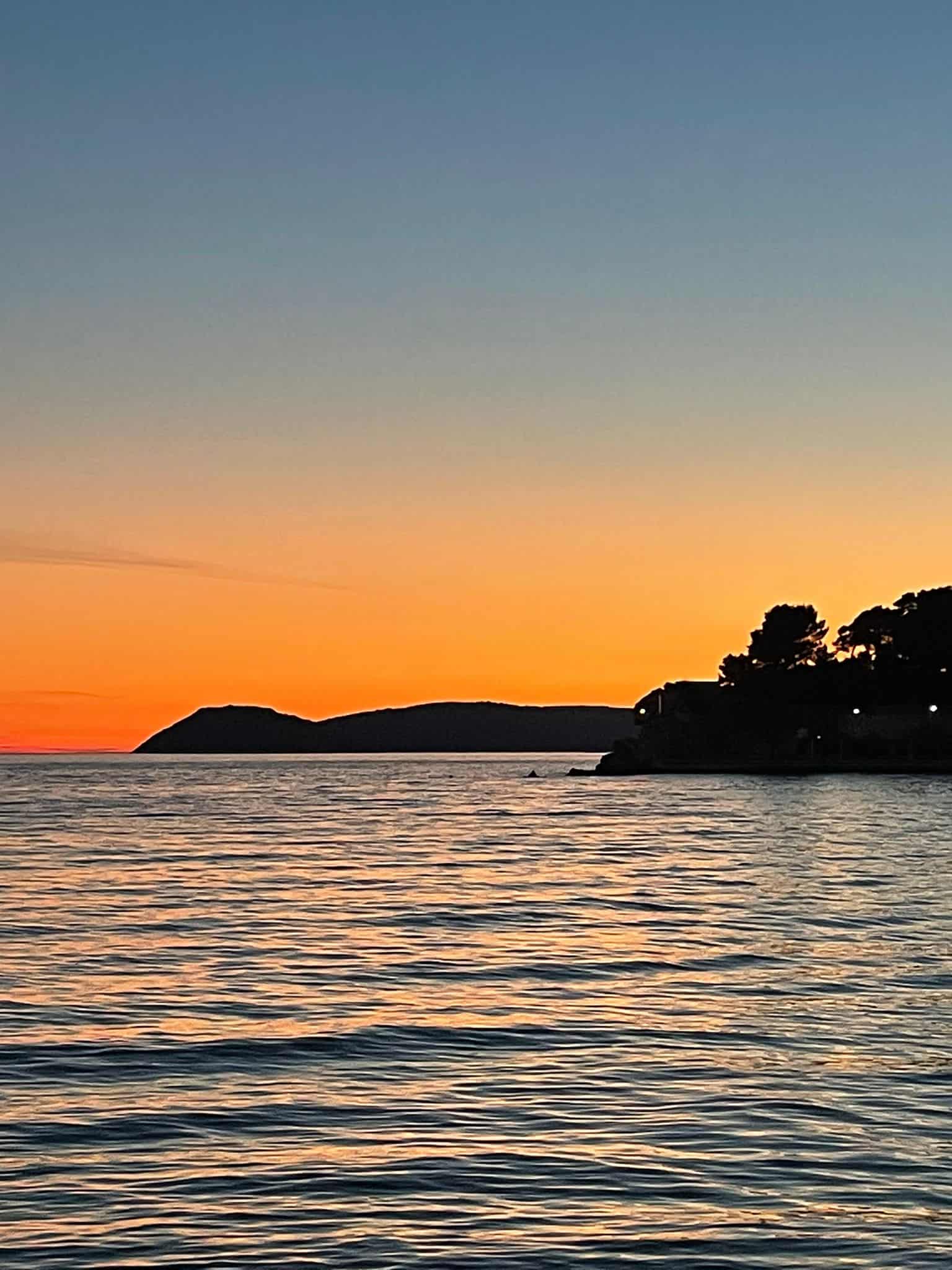 The sun setting over the Adriatic Sea in Split, Croatia
