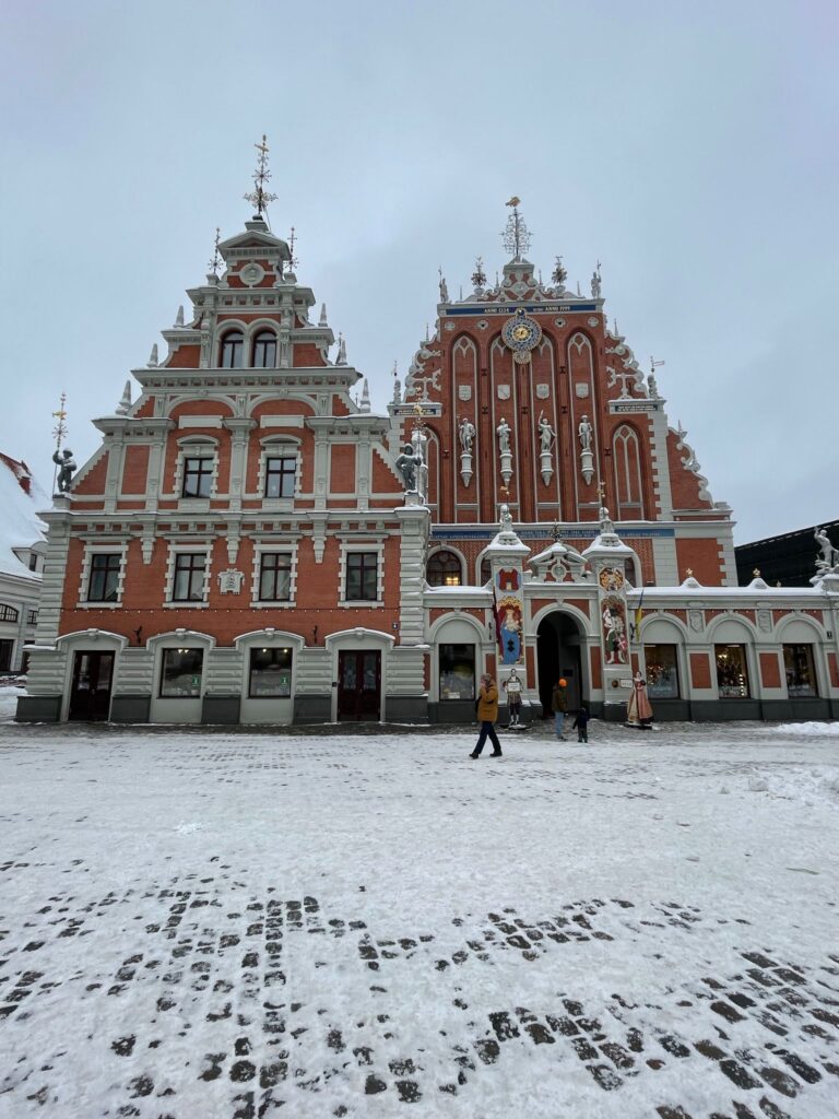 The House of the Blackheads in Riga, Latvia. This former guild building became the president's home briefly when his main residence was being renovated. You can see two buildings forming an "M" shape, rising above the snow 