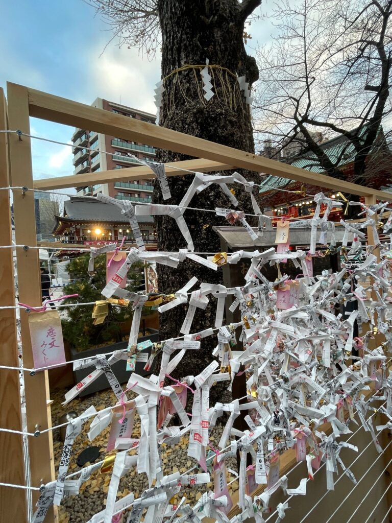 A wall of bad luck omikuji in Tokyo