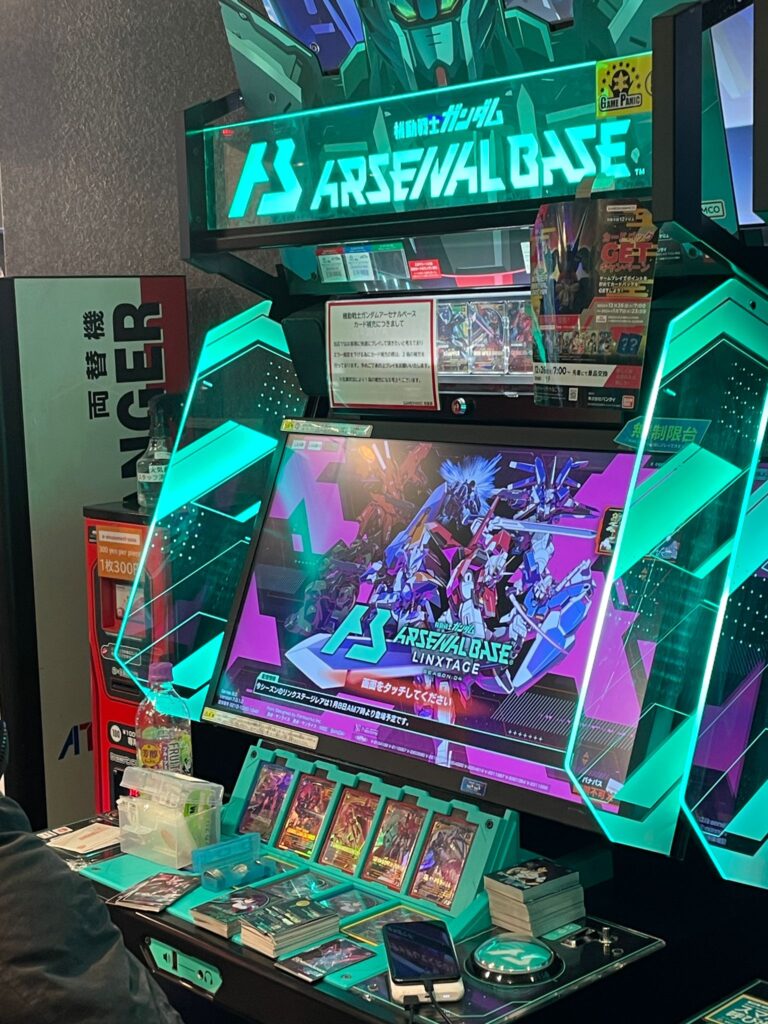 An arcade game utilising the players' own playing cards