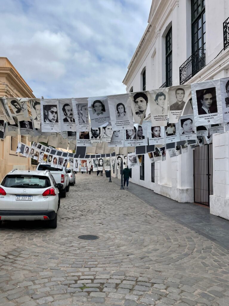 Signs of missing individuals who haven't been seen since the Dirty War hang on the street outside Museo de la Memoria. Many victims were tortured inside the museum before it was converted to serve its current purpose