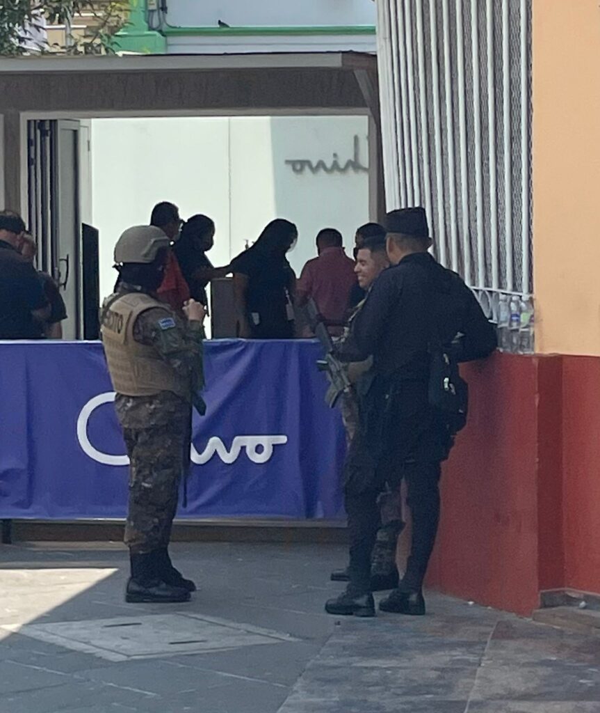 A group of armed police officers holding large guns in San Salvador