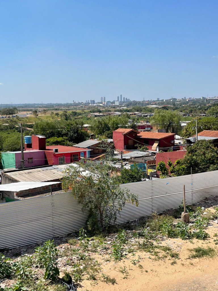 A series of slums surrounded by trees in Paraguay's capital, Asuncion