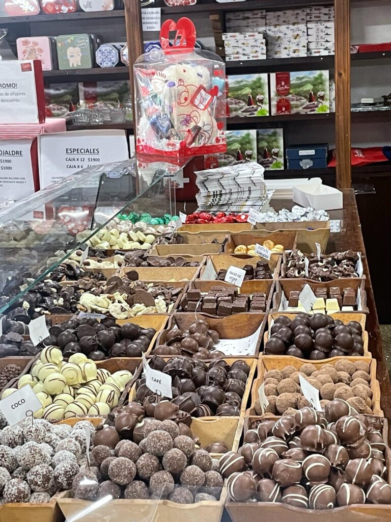 A series of chocolates for sale in Villa General Belgrano. They are each in different boxes as part of a pic 'n' mix selection