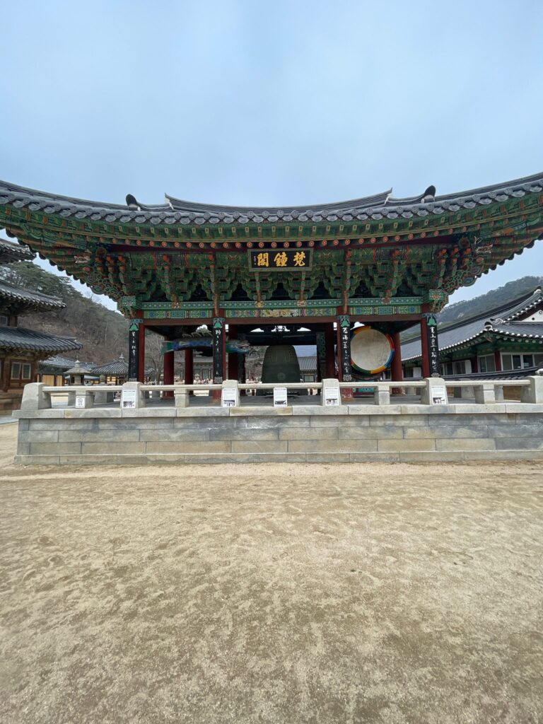 The Hall of Instruments at Beopjusa Temple. From left to right: Mokeo (the wooden fish gong), Beomjong (the temple bell) and Beopgo (the dharma drum). The fourth instrument, Unpan (the cloud gong) is hidden behind Mokeo