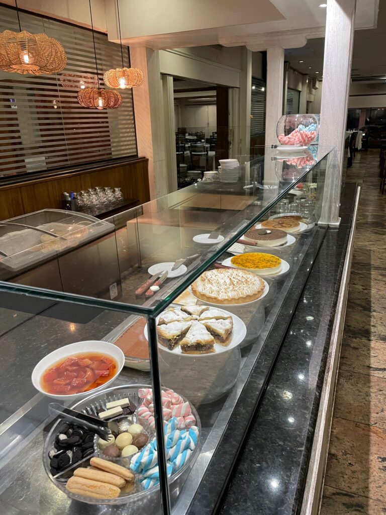 The dessert selection at Asuncion's Paulista Grill. Includes multiple treats such as cheesecakes, chocolates, marshmallows and biscuits among other selections