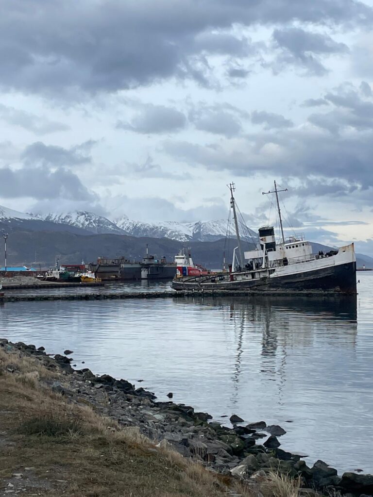 An abandoned ship in the Beagle Channel just off the coast of Ushuaia. In the background you can see the snow-capped mountains rising above it