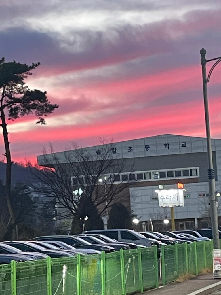 Red winter skies as the sun begins to set on a cold evening in South Korea