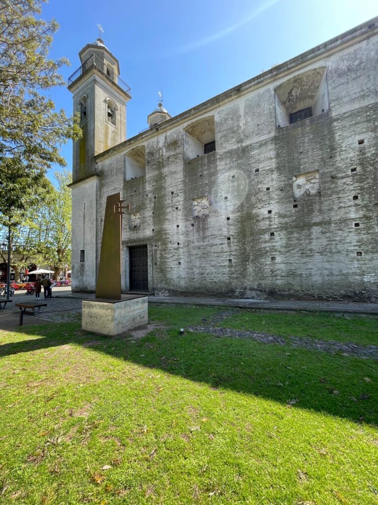 A church with grey and black walls in Uruguay's day trip spot Colonia del Sacramento